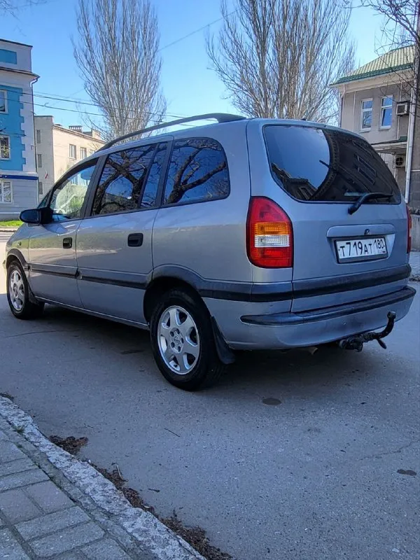Opel зафира opel zafira 1.8 16v 2003 г. в. хорошее состояние авто. пригнана в 2018 году в донецк, один собственник. родной пробег, вся история обслуживания. установлено пропан, фаркоп все узаконено. магнитола андроид. не бит, корозии нет. стекла атермальные родные. хорошая комплектация: 10 airbag, кондиционер, круиз контроль, птф, полный бортовой компьютер. все работает. два комплекта колёс на дисках. два комплекта ковриков. донецк. плохая связь. 497т. р. +79493032667 📞 звоните: +7(949)3032667 - фотография - 2