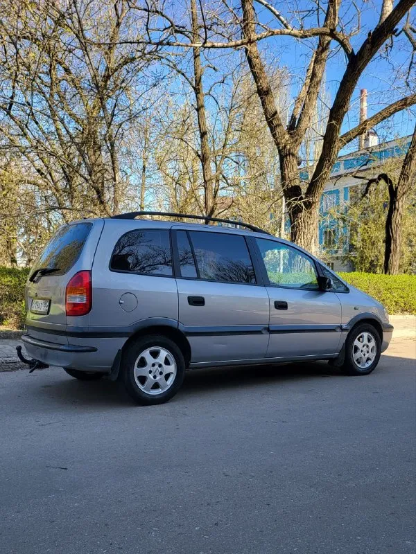 Opel зафира opel zafira 1.8 16v 2003 г. в. хорошее состояние авто. пригнана в 2018 году в донецк, один собственник. родной пробег, вся история обслуживания. установлено пропан, фаркоп все узаконено. магнитола андроид. не бит, корозии нет. стекла атермальные родные. хорошая комплектация: 10 airbag, кондиционер, круиз контроль, птф, полный бортовой компьютер. все работает. два комплекта колёс на дисках. два комплекта ковриков. донецк. плохая связь. 497т. р. +79493032667 📞 звоните: +7(949)3032667 - фотография - 3