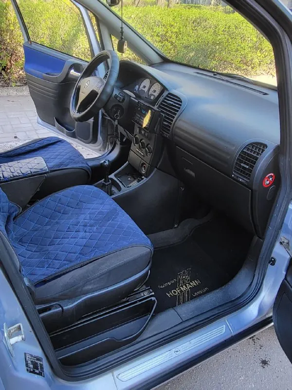 Opel зафира opel zafira 1.8 16v 2003 г. в. хорошее состояние авто. пригнана в 2018 году в донецк, один собственник. родной пробег, вся история обслуживания. установлено пропан, фаркоп все узаконено. магнитола андроид. не бит, корозии нет. стекла атермальные родные. хорошая комплектация: 10 airbag, кондиционер, круиз контроль, птф, полный бортовой компьютер. все работает. два комплекта колёс на дисках. два комплекта ковриков. донецк. плохая связь. 497т. р. +79493032667 📞 звоните: +7(949)3032667 - фотография - 7