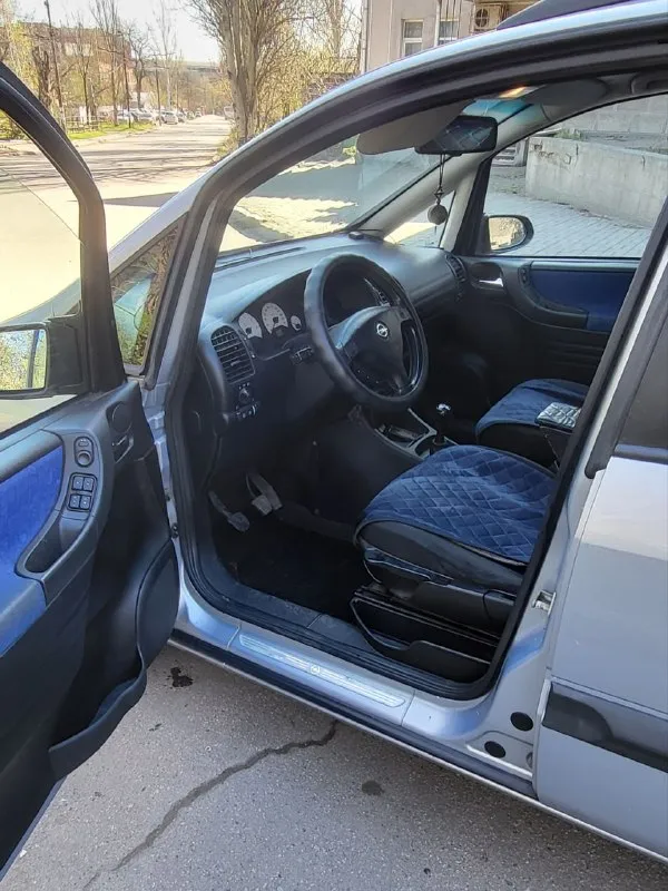 Opel зафира opel zafira 1.8 16v 2003 г. в. хорошее состояние авто. пригнана в 2018 году в донецк, один собственник. родной пробег, вся история обслуживания. установлено пропан, фаркоп все узаконено. магнитола андроид. не бит, корозии нет. стекла атермальные родные. хорошая комплектация: 10 airbag, кондиционер, круиз контроль, птф, полный бортовой компьютер. все работает. два комплекта колёс на дисках. два комплекта ковриков. донецк. плохая связь. 497т. р. +79493032667 📞 звоните: +7(949)3032667 - фотография - 8