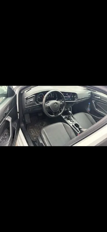 Продам volkswagen jetta sel 2019 года выпуска на надёжном и экономном моторе 1.4т литра. мотор в отличнейшем состоянии, работает превосходно автоматическая коробка asian не dsg переключения передач в идеальном состоянии. передачи переключает мягко и плавно, без пинков и рывков ходовая часть в полнейшем порядке, ничего не гремит и не стучит кузов автомобиля весь ровный и красивый, без рыжиков и сколов. имеет красивый, родной, насыщенный цвет комплектация sel: подогревы сидений, электро-стеклоподъёмники, панорамная крыша, 2-х зонный климат-контроль, круиз-контроль с адаптацией, удержание полосы, 4 видов режимов езды, датчики света и дождя, камера заднего вида и парктроники, слепые зоны, премиальная аудиосистема beatsaudio, carplay, настраиваемая подсветка салона и много других функций автомобиль полностью обслуженный и ухоженный, без вложений. в жизни выглядит ещё лучше, чем на фото юридически полностью чистый, любой вид переоформления цена 2 150 000₽ + торг все вопросы по 📞 звоните: +7(949)7951336 - фотография - 4