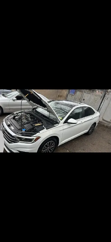 Продам volkswagen jetta sel 2019 года выпуска на надёжном и экономном моторе 1.4т литра. мотор в отличнейшем состоянии, работает превосходно автоматическая коробка asian не dsg переключения передач в идеальном состоянии. передачи переключает мягко и плавно, без пинков и рывков ходовая часть в полнейшем порядке, ничего не гремит и не стучит кузов автомобиля весь ровный и красивый, без рыжиков и сколов. имеет красивый, родной, насыщенный цвет комплектация sel: подогревы сидений, электро-стеклоподъёмники, панорамная крыша, 2-х зонный климат-контроль, круиз-контроль с адаптацией, удержание полосы, 4 видов режимов езды, датчики света и дождя, камера заднего вида и парктроники, слепые зоны, премиальная аудиосистема beatsaudio, carplay, настраиваемая подсветка салона и много других функций автомобиль полностью обслуженный и ухоженный, без вложений. в жизни выглядит ещё лучше, чем на фото юридически полностью чистый, любой вид переоформления цена 2 150 000₽ + торг все вопросы по 📞 звоните: +7(949)7951336 - фотография - 7