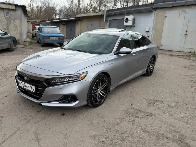 Honda accord hybrid touring -машина 2021г -объём двигателя: 2.0л -пробег :75.000км -тип двигателя: гибрид -коробка передач: автомат -привод: передний -люк -камера заднего вида - подогрев руля -подогрев боковых зеркал - подогрев/вентиляция сидений - цифровая панель приборов - датчик дождя - датчик света - активный круиз-контрол - датчики мёртвых зон - контроль пешеходов при движении задним ходом -беспроводная зарядка -электрорегулировка сидений -память сидений -проекция на лобовое стекло вин: 1hgcv3f99ma018844 💲цена: 3.100.000руб. ☎телефон: +7(949)326-93-73 - фотография - 1