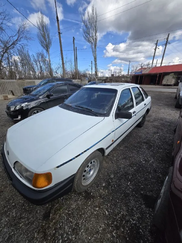 Продам ford sierra 1989 год, 1.8мт, 90 л. с. цена: 150000 рублей. г. дебальцево. тел. : +79494628813 машина в хорошем состоянии, мотор и коробка работают отлично, по технике прошлым летом менялся стартер (прошлый закусывало на горячую, ставили полностью новый, старый в багажнике), потом осенью менялась система охлаждения двигателя, а именно помпа (старая тоже в багажнике), радиатор (поставлен увеличенный от 2.0l), а так же термостат. месяц назад была заменена эластичная муфта, а так же увидели, что правый лонжерон требовал сварки, ну и сразу заварили, последнее фото. в тоже время заменили все масла и фильтра. по кузову понятное дело есть куда руки приложить, но для своих лет просто огонь. так же стоит 2din адроид магнитола. из неисправностей перестал работать спидометр, уже нет времени этим заниматься. 📲 tg: @strasher 📞 звоните: +7(949)4628813 - фотография - 1