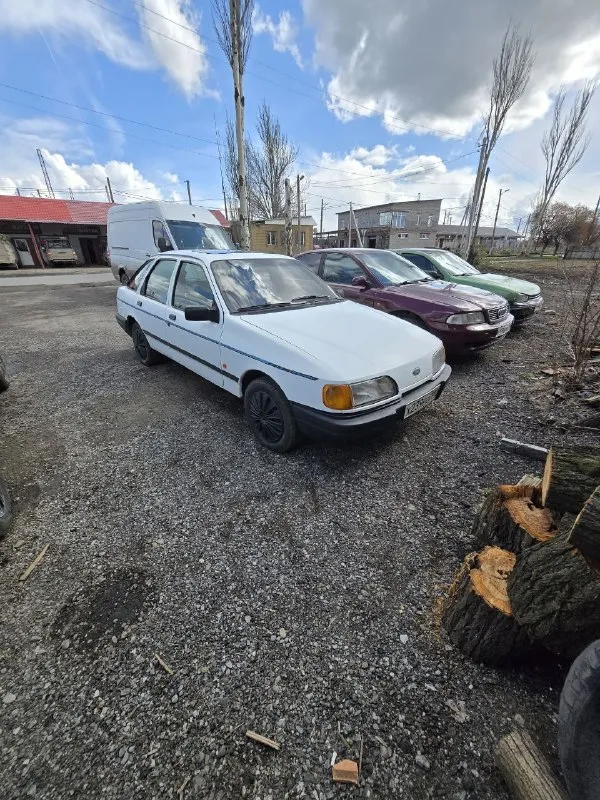 Продам ford sierra 1989 год, 1.8мт, 90 л. с. цена: 150000 рублей. г. дебальцево. тел. : +79494628813 машина в хорошем состоянии, мотор и коробка работают отлично, по технике прошлым летом менялся стартер (прошлый закусывало на горячую, ставили полностью новый, старый в багажнике), потом осенью менялась система охлаждения двигателя, а именно помпа (старая тоже в багажнике), радиатор (поставлен увеличенный от 2.0l), а так же термостат. месяц назад была заменена эластичная муфта, а так же увидели, что правый лонжерон требовал сварки, ну и сразу заварили, последнее фото. в тоже время заменили все масла и фильтра. по кузову понятное дело есть куда руки приложить, но для своих лет просто огонь. так же стоит 2din адроид магнитола. из неисправностей перестал работать спидометр, уже нет времени этим заниматься. 📲 tg: @strasher 📞 звоните: +7(949)4628813 - фотография - 2