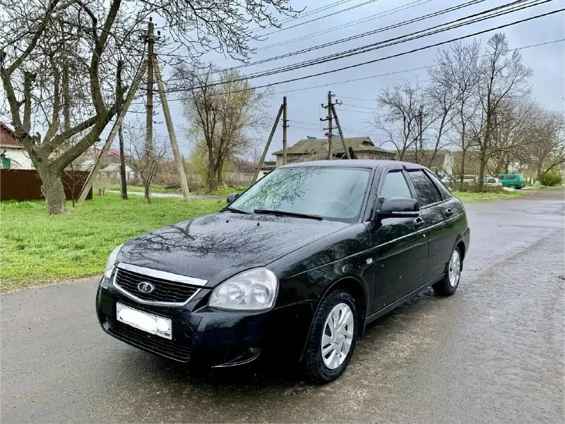 Доброго времени суток. продам lada priora 2009г 16кл двигатель работает отлично масло не жрет. коробка не хрустит не выбивает скорости включаются плавно, ходовая мягкая тихая, за машиной следили и ухаживали, днище целое, стаканы задние, передние целые, низа дверей тоже целые, пробег заводской 178000т км. комплектация: кондиционер, abs, эур, магнитола usb, aux, подушка безопасности, доводчик боковых стекол, сигнализация с автозапуском, за авто вообще не стыдно, с документами тоже полный порядок переоформление без проблем, машина без дтп, остекление все заводское, остальные вопросы по телефону телеграмм тоже на этом номере. торг у капота осмотр г. харцызск. связь +79493296585 тг мах всем добра👍 - фотография - 2