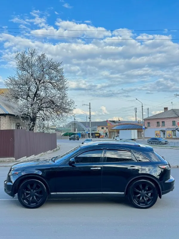Infiniti fx35 инфинити 2007г 💰870.000💰 рестайлинг поколения (2006-2008) объем 3.5 мотор в идеальном состоянии, не дымит, не троит, весь сухой! едет очень бодро коробка автомат, работаем идеально, переключает мягко, не пинает, надежный японец ✅ ходовая не гремит, не стучит, не тянет, обслужена машинка. документы чистые ✅ без запретов, без штрафов, переоформление без проблем, сразу в мрэо, чтоб оформить на вас! исправно все работают, бензина по городу 13л осмотр г. макеевка цена 870.000 руб торг разумный у капота обмен тоже можно рассмотреть, адекватно только цените свое авто! тел. +7949-489-08-56 - +7 (949) 643-84-43 тг есть на двух номерах автотека зеленая ✅ 📞 🇷🇺 звоните: +7(908)5679496 - фотография - 8