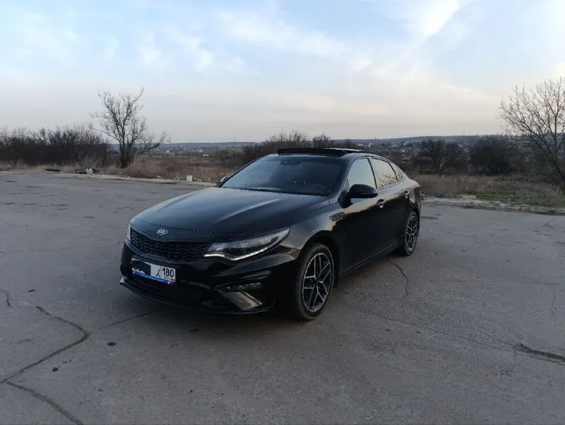 Продам автомобиль kia optima 2019 года. машина официальная, не пригон. комплектация: gt line кожаный салон, электропакет передних сидений, подсветка по контуру, обогрев всех сидений, руля, боковых зеркал, обдув передних сидений, 2-х зонный климат контроль, премиум музыка harman/kardon, датчики слепых зон, давления, дождя и света, auto hold, start/stop, бесключевой доступ, авто затемняющее стекло заднего вида, панорамная крыша, мультимедиа (android auto, apple carplay), камера 360°, авто парковка, круиз контроль, адаптивная led оптика. заводской обвес gt. диски r18. 2.4, автомат. 157.000 км родного пробега. цена: 1.700.000₽ тел: +7(949)-978-61-00 📲 tg: @ziko_lini 📞 звоните: +7(949)9786100 - фотография - 2