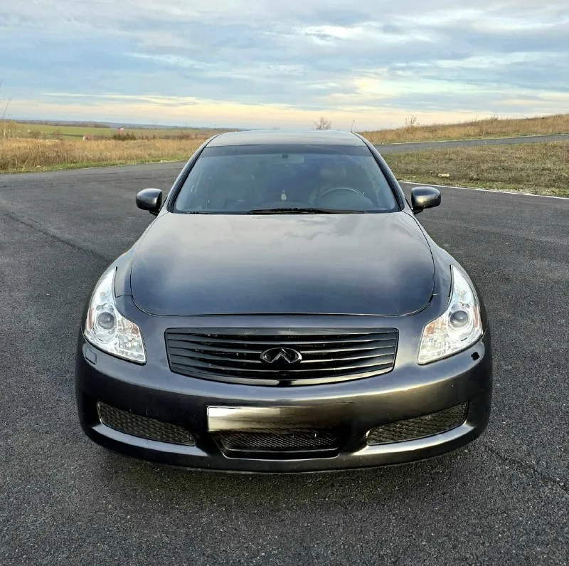 ❗️в продаже infiniti g35 2007 год❗️ ⚙️двигатель 3.5 (316 л. с) ❗️полный привод❗️ автомобиль в отличном состоянии, вложений не требует абсолютно. стоит контрактный двигатель, ходовая перебрана вся, ничего не стучит. кузов в отличном состоянии. коробка без пинков и рывков, листает чётко и переключает плавно, очень бодрая на разгон🔥кондиционер работает. комплектация sport. - подрулевые лепестки - спортивный режим - bi-led модули в фарах - 4 эл. стеклоподьемника - эл. привод передних сидений - память сидений и руля - датчик света - круиз контроль - 2-х зонный климат - бесключевой доступ - кнопка start/stop - установлена tesla магнитола, не китай за 15 тысяч! - шикарные 18 диски на летней резине. ✅️юридически чистая, я собственник, диагностическая карта имеется, переоформление без проблем❗️ 📞+79493439047 👤 - vk 🏠 осмотр г. снежное ----------------------------------------------- 💵 1.350.000 торг возле автомобиля. 📞 звоните: +7(949)3439047 - фотография - 3