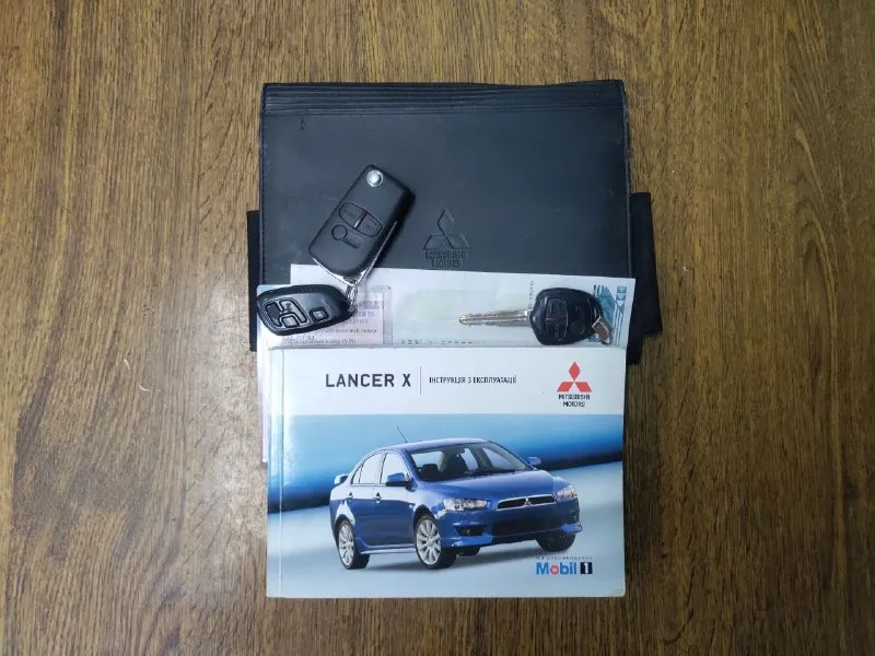 Продажа от владельца (с 2017 года). Чистая автотека. Митсубиси лансер 10 поколения, 2.0 акпп, 2007 год выпуска. Пробег реальный и составляет 219 тыс. Км. Все стекла оригинал. 2 ключа. Максимальная комплектация: подрулевые переключатели скоростей, обвес со спойлером, легкосплавные диски r16, накладки под карбон в салоне, кожаный руль, кожаная ручка кулисы, дистанционный центральный замок, климат контроль, круиз контроль, кнопки управления магнитолой на руле.
Полностью обслужена, недавно сделано большое то: заменено масло в моторе и акпп, заменен антифриз и жидкость гидроусилителя. До дтп была в очень хорошем состоянии. Повреждена задняя часть кузова, сработала подушка безопасности пассажирского сиденья. Нет времени на восстановление. Цена 350 тысяч рублей (небольшой торг для быстрого покупателя). Осмотр в районе радио рынка маяк. +79494643608 - фотография - 9