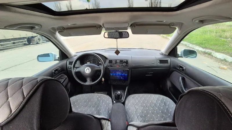 Volkswagen bora цена 550т. р. aqy 2.0-литровый 8-клапанный двигатель 115л. с мкп 5ст. пробег 222000т. км. технически чистый и исправный автомобиль. по технической части нареканий нет. двигатель, коробка, подвеска работают исправно. за машиной следил. на запчастях не экономил. все жидкости и фильтра менялись вовремя. замена масла каждые 5 тыс. км. по комплектации: 2 ключа, сервисная книга, abs, электро регулировка зеркал с подогревом, датчик дождя, 4 стеклоподъёмника, центральный замок, люк ( работает во всех положениях), 4 подушки безопасности, подогрев сидений, android магнитофон, качественная музыка передний и задний ряд, камера заднего вида. комплект колёс (зима r16 стальные + колпаки, лето r16 литые hre ff10) один собственник, учёт на мне. макеевка телеграм: @karateturtle тел. : и мах +7(949)0050816 📲 tg: @karateturtle 📞 звоните: +7(949)0050816 - фотография - 5