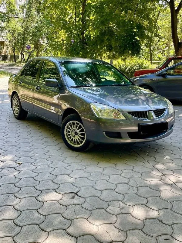 Продам автомобиль, г. мариуполь mitsubishi lanser 9, 1.6 автомат, 2005 год, пробег 250 тыс км. комплектация:кондиционер, подогрев сидений, электро пакет, электро зеркала, абс. с документами порядок, цена 500 руб при осмотре торг уместен +79490533096 - фотография - 1