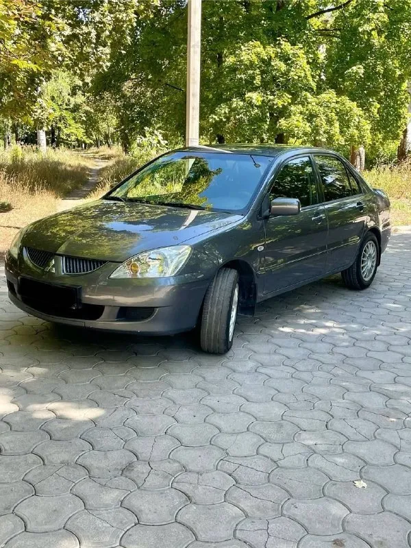Продам автомобиль, г. мариуполь mitsubishi lanser 9, 1.6 автомат, 2005 год, пробег 250 тыс км. комплектация:кондиционер, подогрев сидений, электро пакет, электро зеркала, абс. с документами порядок, цена 500 руб при осмотре торг уместен +79490533096 - фотография - 2