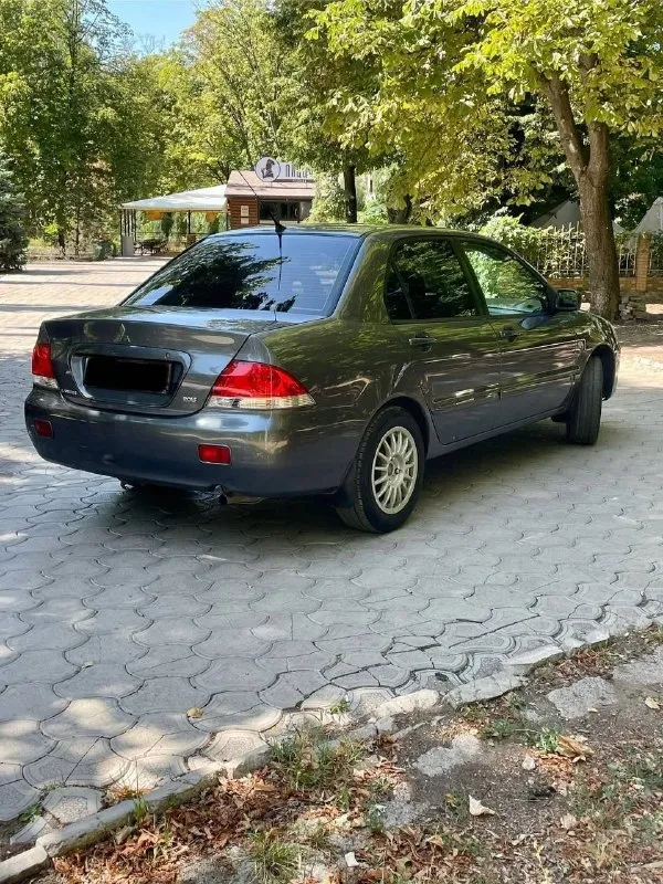 Продам автомобиль, г. мариуполь mitsubishi lanser 9, 1.6 автомат, 2005 год, пробег 250 тыс км. комплектация:кондиционер, подогрев сидений, электро пакет, электро зеркала, абс. с документами порядок, цена 500 руб при осмотре торг уместен +79490533096 - фотография - 4