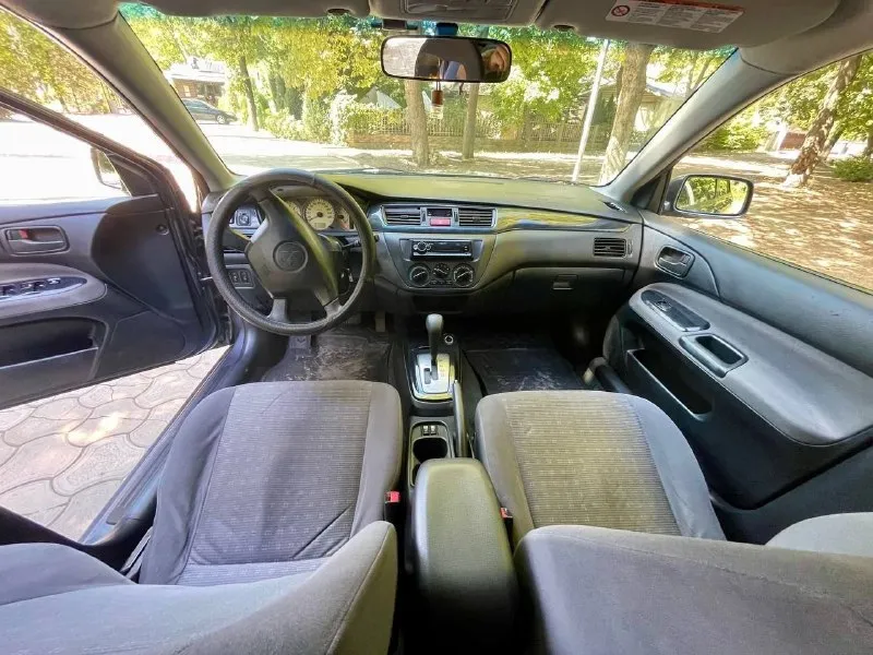 Продам автомобиль, г. мариуполь mitsubishi lanser 9, 1.6 автомат, 2005 год, пробег 250 тыс км. комплектация:кондиционер, подогрев сидений, электро пакет, электро зеркала, абс. с документами порядок, цена 500 руб при осмотре торг уместен +79490533096 - фотография - 5