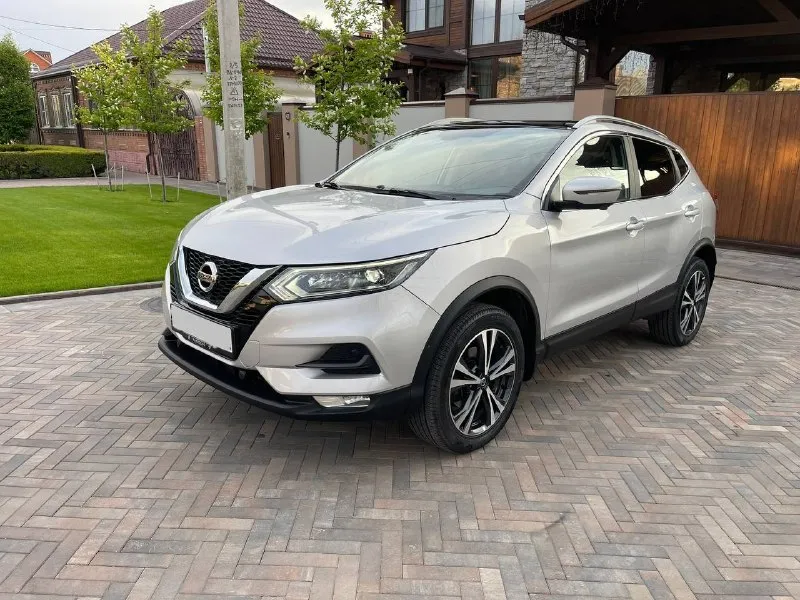 Nissan qashqai 2021г цена 1.900.000 торг 2.0i (147 л. с.) автомат привод fwd пробег 63 тыс один хозяин официальный авто, куплен и обслужен у оф. дилера колёса зима и лето салон кожа обогрев сидений обогрев руля климат контроль 2-ух зонный круиз контроль полноцветный дисплей led фары датчики давления в шинах датчики дождя и света колеса r18 электропривод зеркал парктроники, камеры 360* мультируль осмотр донецк телеграмм +79779106272 📞 +7(949)9717949 📲 tg: сергей 📞 звоните: +7(949)9717949 - фотография - 1
