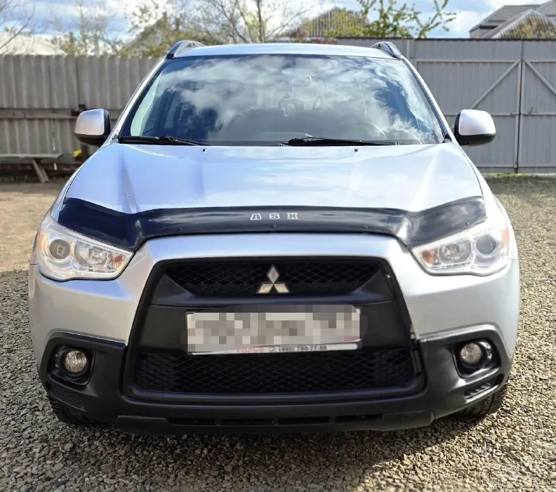 Продаю автомобиль mitsubishi asx 2011 года в отличном состоянии для своих лет. один владелец с момента покупки. без дтп родной пробег 200000. по кузову как на фото гнили ржавчины нет. мотор 1.6 механика. два комплекта ключей. то проходила во время по регламенту. есть сервисная книжка, заказ наряды. салон чистый ухоженный. по тех. части в данный момент вложений не требует. продажа с полным переоформлением. юридически чист. осмотр г. донецк звонить по номеру телефона +79490881846 или пишите в телеграмм если нет связи. цена 1070000. - фотография - 1