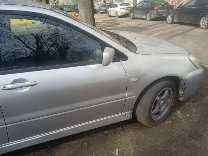 Продам лансер 9 коробка автомат, в хорошем состоянии, не пинает, ходовая мячик, грм недавно менял, также менял масло, фильтра. машина в хорошем состоянии, телефон для связи +79495105214 связи плохая, если что пишите в л. с. цена 245.000торг возле капота. 📞 звоните: +7(949)5105214 - фотография - 2