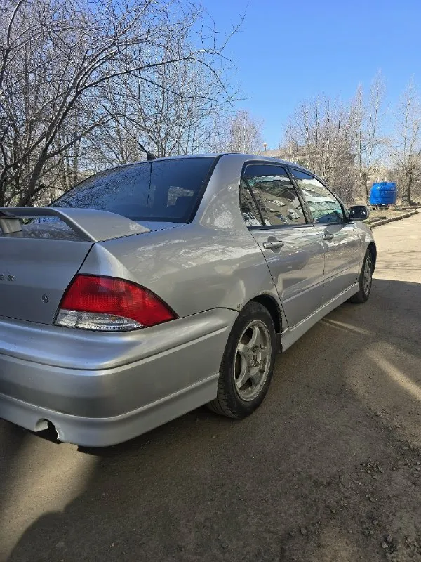 Продам лансер 9 коробка автомат, в хорошем состоянии, не пинает, ходовая мячик, грм недавно менял, также менял масло, фильтра. машина в хорошем состоянии, телефон для связи +79495105214 связи плохая, если что пишите в л. с. цена 245.000торг возле капота. 📞 звоните: +7(949)5105214 - фотография - 4