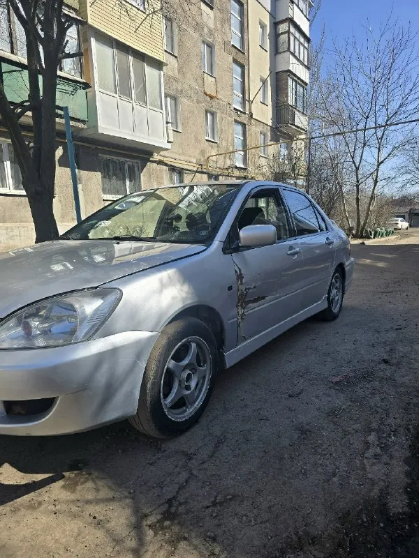 Продам лансер 9 коробка автомат, в хорошем состоянии, не пинает, ходовая мячик, грм недавно менял, также менял масло, фильтра. машина в хорошем состоянии, телефон для связи +79495105214 связи плохая, если что пишите в л. с. цена 245.000торг возле капота. 📞 звоните: +7(949)5105214 - фотография - 8