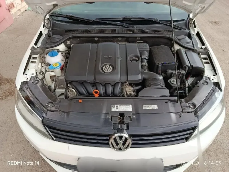 Продам volkswagen jetta 6, 2012 год мотор 2.5 бензин коробка автомат aisin 6-ступ автомат не дсг пробег 105.000 км гаражное хранение. авто в такси не было комплектация: салон эко-кожа, подогрев сидений, подогрев зеркал, кpуиз контpоль, люк, кондиционер, штатная магнитола 2 комплекта резины. фильтра и маслo пoмeняны цена 1.100.000 г. горловка +79494021175 📞 звоните: +7(949)4021175 - фотография - 4
