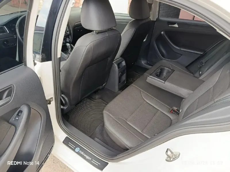 Продам volkswagen jetta 6, 2012 год мотор 2.5 бензин коробка автомат aisin 6-ступ автомат не дсг пробег 105.000 км гаражное хранение. авто в такси не было комплектация: салон эко-кожа, подогрев сидений, подогрев зеркал, кpуиз контpоль, люк, кондиционер, штатная магнитола 2 комплекта резины. фильтра и маслo пoмeняны цена 1.100.000 г. горловка +79494021175 📞 звоните: +7(949)4021175 - фотография - 9