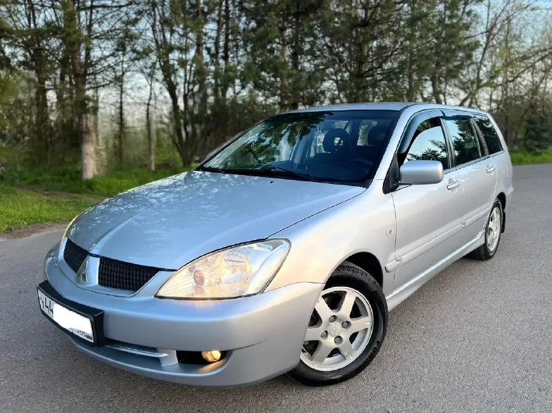 Продам mitsubishi lancer lx рестайлинг в состоянии близко к новому автомобилю! 1.6л. бензин. мкпп. семейный универсал. куплена в 2007 году в автосалоне. пробег 141.тыс. км. один единственный владелец! за всю жизнь (была в одной семье). птс оригинал. сборка япония. комплектация: кондиционер(заправлен). гидроусилитель руля. подушки безопасности airbag. система abs. система esp. подогрев сидений. эл регулировка зеркал с обогревом. все эл. стеклоподъемники с доводчиками. кожаный руль. противотуманные фары. заводские титановые диски r15. доп установлена сигнализация. магнитола с качественной акустикой. новая летняя резина formula. 195/60/15. новому хозяину для приятной езды есть всё, докупать ничего не придётся. кузов оцинкован! обработана. донецк 💰цена 615.000₽ 📞 +7 (949) 452-20-26 - фотография - 1
