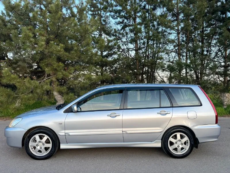 Продам mitsubishi lancer lx рестайлинг в состоянии близко к новому автомобилю! 1.6л. бензин. мкпп. семейный универсал. куплена в 2007 году в автосалоне. пробег 141.тыс. км. один единственный владелец! за всю жизнь (была в одной семье). птс оригинал. сборка япония. комплектация: кондиционер(заправлен). гидроусилитель руля. подушки безопасности airbag. система abs. система esp. подогрев сидений. эл регулировка зеркал с обогревом. все эл. стеклоподъемники с доводчиками. кожаный руль. противотуманные фары. заводские титановые диски r15. доп установлена сигнализация. магнитола с качественной акустикой. новая летняя резина formula. 195/60/15. новому хозяину для приятной езды есть всё, докупать ничего не придётся. кузов оцинкован! обработана. донецк 💰цена 615.000₽ 📞 +7 (949) 452-20-26 - фотография - 3