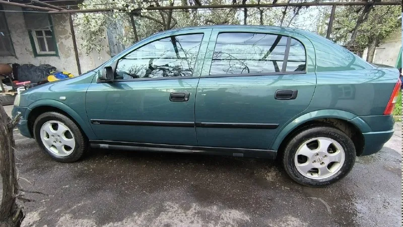 Продам opel astra g 2001год. "пригнан с германии в 2021 году" движок1.6 102л. с, миханика. пробег 265тыс. заменены:колодки, фильтра, подшипники, рулевые тяги и наконечники, масло, задние стойки стабилизатора, задние проставки под пружины, передние пружины, подушки двигателя в круг, выхлопная система полностью. по кузову(металу) все отлично, гнили нет. был крашен вкруг в 2022.машина в отличном состоянии, салон в порядке, сел и поехал. на данный момент машина на зимней липучке на докат, новую летнюю резину отдаю в придачу. с документами всё в порядке, я хозяин, остальная интересующая информация у капота. цена 400000т. р. находится в г. ждановка днр тел:+79498581572(миранда) +79494650883(феникс) максим. 📞 звоните: +7(949)8581572 - фотография - 3