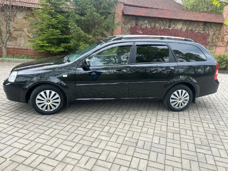 Продаю chevrolet лачетти год выпуска 2013универсал с родным пробегом 123 тыс технически автомобиль в идеальном состоянии!! без малейшего вложения все росходники поменяны! все т-о автомобиль проходил - по регламенту! автомобиль гаражного хранения очень бережной эксплуатации автомобиль вся в родном металле без дтп без гнили ржавчин готов на любые проверки! салон отличный состояние нового! работает абсолютно всё! комплектация объем двигателя1600 кондиционер все стеклоподъёмники гидроусилитель руля электрозеркала подогрев зеркал корректор фар. абс подушки безопасности сигнализация центральный замок два комплекта ключей хорошая акустика магнитола андроид камера сервисные книги чеки противотуманки. два комплекта резины фото и описание соответствует автомобилю! просмотр город донецк будённовский район звонить сим1 +79490983452 сим2 +79495095914 цена 765 торг 📲 tg: @aaa20001503 📞 звоните: +7(949)0983452 - фотография - 2