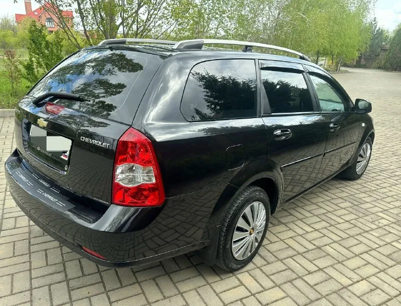 Продаю chevrolet лачетти год выпуска 2013универсал с родным пробегом 123 тыс технически автомобиль в идеальном состоянии!! без малейшего вложения все росходники поменяны! все т-о автомобиль проходил - по регламенту! автомобиль гаражного хранения очень бережной эксплуатации автомобиль вся в родном металле без дтп без гнили ржавчин готов на любые проверки! салон отличный состояние нового! работает абсолютно всё! комплектация объем двигателя1600 кондиционер все стеклоподъёмники гидроусилитель руля электрозеркала подогрев зеркал корректор фар. абс подушки безопасности сигнализация центральный замок два комплекта ключей хорошая акустика магнитола андроид камера сервисные книги чеки противотуманки. два комплекта резины фото и описание соответствует автомобилю! просмотр город донецк будённовский район звонить сим1 +79490983452 сим2 +79495095914 цена 765 торг 📲 tg: @aaa20001503 📞 звоните: +7(949)0983452 - фотография - 4
