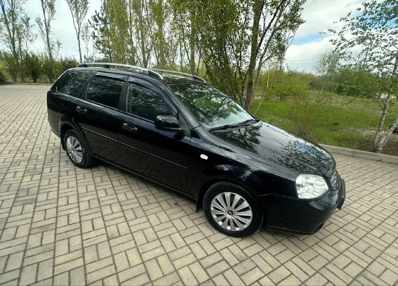 Продаю chevrolet лачетти год выпуска 2013универсал с родным пробегом 123 тыс технически автомобиль в идеальном состоянии!! без малейшего вложения все росходники поменяны! все т-о автомобиль проходил - по регламенту! автомобиль гаражного хранения очень бережной эксплуатации автомобиль вся в родном металле без дтп без гнили ржавчин готов на любые проверки! салон отличный состояние нового! работает абсолютно всё! комплектация объем двигателя1600 кондиционер все стеклоподъёмники гидроусилитель руля электрозеркала подогрев зеркал корректор фар. абс подушки безопасности сигнализация центральный замок два комплекта ключей хорошая акустика магнитола андроид камера сервисные книги чеки противотуманки. два комплекта резины фото и описание соответствует автомобилю! просмотр город донецк будённовский район звонить сим1 +79490983452 сим2 +79495095914 цена 765 торг 📲 tg: @aaa20001503 📞 звоните: +7(949)0983452 - фотография - 6