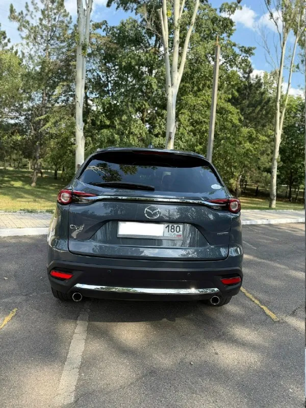 Продам mazda cx-9 год выпуска:2021 двигатель:2,5 турбо бензин пробег :48000 коробка:автомат привод:полный автомобиль в комплектации carbon edition:кожаный красный салон, электро-регулировка сидений, люк, кнопка старт-стоп, система экстренного торможения, капитанские сидения, черные литые диски r20,адаптивный свет, удержание полосы, датчики слепых зон, адаптивный круиз,2 режима памяти водительских сидений, подогрев руля, подогрев и вентиляция сидений, бесключевой доступ, электропривод двери багажника(свободные руки), автоскладывание зеркал заднего вида, передний и задний парктроник, камера заднего вида, аудиосистема bose,3х зонный климат-контроль с управление для задних пассажиров, заводская тонировка стекол, шторки на задних пассажирских стеклах, черный потолок, беспроводная зарядка, apple carplay и android auto, зеркала заднего вида с автозатемнением. машина технически полностью обслужена, покрыта керамикой. 4,7🍋торг. +79493717837 📞 звоните: +7(949)3717837 - фотография - 2