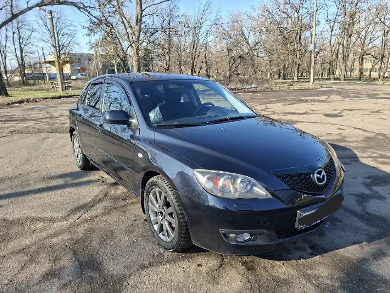 Mazda 3 пробег 96 т. км год выпуска: 2007 категория транспортного средства: в объем:1.6 привод: передний ✅ тип двигателя:бензин коробка: автомат 1владелец, ✅ 2 комплекта колес без дтп ключа 🔑🔑 техосмотр есть зеленейшая автотека по кузову смотрится отлично ✅ салон ухоженный ✅ коробка отлично ✅ юридчески чистая✅ 📍г. макеевка +7 949 416 88 57 +7 985 363 82 47 цена 680т руб 🔥🔥🔥 📞 звоните: +7(949)4168857 - фотография - 1