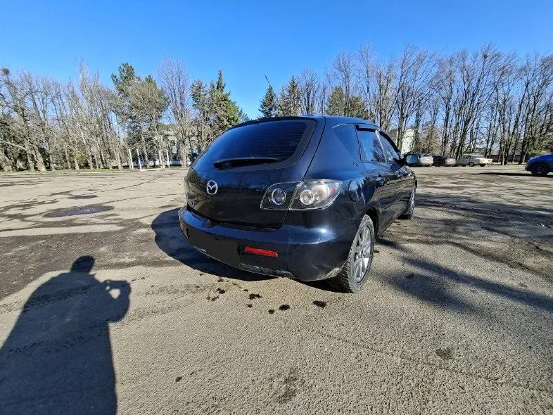 Mazda 3 пробег 96 т. км год выпуска: 2007 категория транспортного средства: в объем:1.6 привод: передний ✅ тип двигателя:бензин коробка: автомат 1владелец, ✅ 2 комплекта колес без дтп ключа 🔑🔑 техосмотр есть зеленейшая автотека по кузову смотрится отлично ✅ салон ухоженный ✅ коробка отлично ✅ юридчески чистая✅ 📍г. макеевка +7 949 416 88 57 +7 985 363 82 47 цена 680т руб 🔥🔥🔥 📞 звоните: +7(949)4168857 - фотография - 3