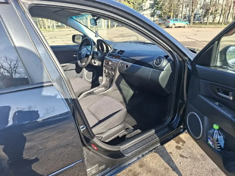 Mazda 3 пробег 96 т. км год выпуска: 2007 категория транспортного средства: в объем:1.6 привод: передний ✅ тип двигателя:бензин коробка: автомат 1владелец, ✅ 2 комплекта колес без дтп ключа 🔑🔑 техосмотр есть зеленейшая автотека по кузову смотрится отлично ✅ салон ухоженный ✅ коробка отлично ✅ юридчески чистая✅ 📍г. макеевка +7 949 416 88 57 +7 985 363 82 47 цена 680т руб 🔥🔥🔥 📞 звоните: +7(949)4168857 - фотография - 4
