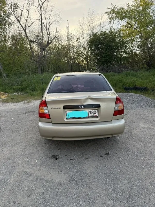 Hyundai accent тагаз ii, 2006. продам акцент в хорошем технической состоянии, ходовая часть хорошо обслужена, солон в хорошем состоянии, коробка не хрустит не выбивает, кузов требует небольшой уход, как видно багажник имеет на ребре жёсткости вмятину, вовремя проводились технические обслуживания и замена всех расходников, печка кондиционер в работают, центральный замок, два комплекта резины, в целом машина едет бодро, сел поехал, цену вижу 420 тыс руб. торг уместен, все остальные вопросы по телефону +7 949 823 35 45 или в л. с 📞 звоните: +7(949)8233545 - фотография - 4