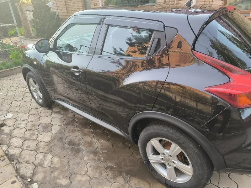 В продаже nissan juke 2012 год, 1.6 бензин. пробег 212 тыс. км. автомобиль не крашен, без дтп. стекла все родные. владею более трёх лет. обслужен, ничего делать не нужно, двигатель работает тихо, без лишнего шума, коррозии кузова нет. вариатор полностью в исправном состоянии, обслужен, на гарантии ещё. комплектация: климат-контроль, круиз-контроль, подогрев сидений, стекол, зеркал. управление мультимедиа на руле, мультимедийный экран, камера заднего вида и многое другое для комфортной езды. без вложений!!!! цена: 1 млн. руб. осмотр первомайск, стаханов. тел: +7(959)1693201 (telegram, max) 📞 звоните: +7(959)1693201 - фотография - 7