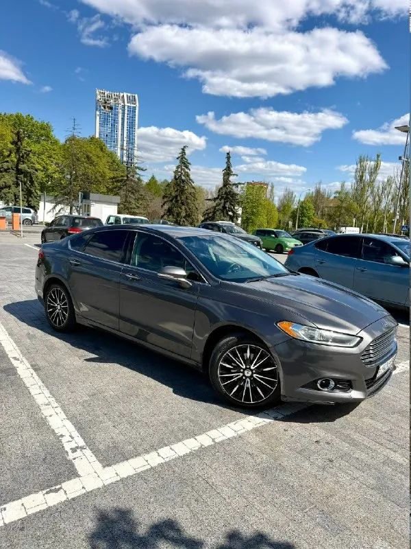 Продам ford fusion (north america). 2014г (по вин коду 2015г). машина технически в хорошем состоянии, по ходовой все отлично, ошибок никаких нет, по кузову есть нюансы, которые требуют покраски, передний бампер нужно менять. 18-е диски, масло менялось каждые 7 тыс. км, двигатель масло не ест. двигатель 2.0 ecoboost, 240 л. с. пробег родной - 249 000км собственник, 1 владелец в птс. комплектация titanium : бесключевой доступ на всех дверях удаленный автозапуск с ключа память сидений камера заднего вида подогрев сидений кнопка запуска start/stop круиз-контроль датчики давления шин атермальная пленка датчик света двухзонный климат-контроль кожаный салон цена 1 200 000р (торг) +79494230109 донецк 📞 звоните: +7(949)4230109 - фотография - 1