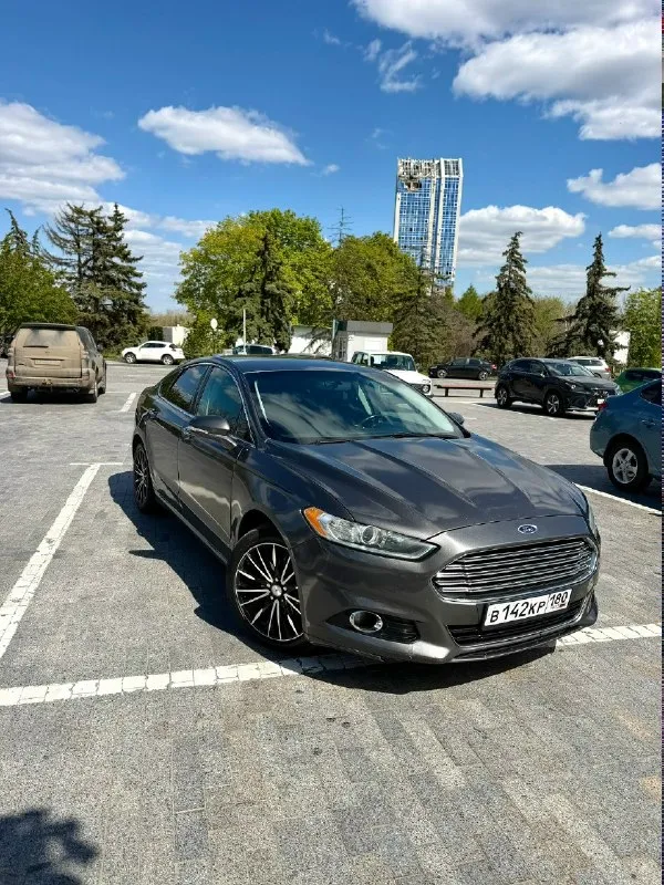 Продам ford fusion (north america). 2014г (по вин коду 2015г). машина технически в хорошем состоянии, по ходовой все отлично, ошибок никаких нет, по кузову есть нюансы, которые требуют покраски, передний бампер нужно менять. 18-е диски, масло менялось каждые 7 тыс. км, двигатель масло не ест. двигатель 2.0 ecoboost, 240 л. с. пробег родной - 249 000км собственник, 1 владелец в птс. комплектация titanium : бесключевой доступ на всех дверях удаленный автозапуск с ключа память сидений камера заднего вида подогрев сидений кнопка запуска start/stop круиз-контроль датчики давления шин атермальная пленка датчик света двухзонный климат-контроль кожаный салон цена 1 200 000р (торг) +79494230109 донецк 📞 звоните: +7(949)4230109 - фотография - 2