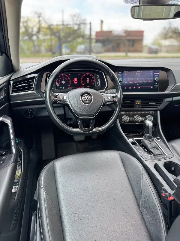 Продам volkswagen jetta sel 2019 года. мотор 1.4 turbo, коробка 8-ми ступенчатый автомат. богатая комплектация: климат контроль, панорама, электронная приборка, музыка beats, адаптивный круиз контроль, удержание в полосе. все стекла заводские, подушки не стреляли. 2 комплекта шин на дисках лето r18, зима на оригинальных r16 (оба комплекта новые). машина обслужена, вложений не требует. 3vwe57bu2km102283 город: макеевка пробег: 145.000 км цена: 1.850.000 руб. (возможна продажа в кредит) ☎️ +7 (949) 373-86-22 telegram ☎️ +7 (952) 412-23-63 📞 🇷🇺 звоните: +79493738622 - фотография - 9