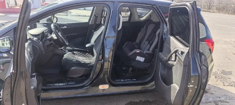 Продам личный автомобиль opel мерива б 2012 года выпуска. пробег 218000. цена 615000.машина полностью обслужена. вложений не требует. стоит андроид магнитола хорошая. сигнализация с автозапуском. есть видеорегистратор с камерой заднего вида. масло не ест. менял каждые семь тысяч. есть мелкие царапины по кузову. я хозяин. машина оформлена на меня. переоформление без проблем. по документам всё нормально. два комплекта колёс. зимняя резина на дисках. торг уместен. +79496849687. по запросу сделаю видео обзор. авто находится в снежном. могу по договорённости пригнать в ближайший город. 📞 звоните: +7(949)6849687 - фотография - 7