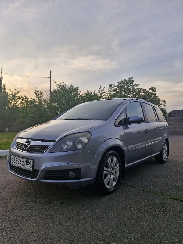 Продам opel zafira b 2005 бензин / газ двигатель 1.8 (140лс) пробег 218 000 км на 215 000 км был выполнен капитальный ремонт двигателя. установлен новый радиатор охлаждения, термостат, датчик температуры, насосная станция. промыта печка салона. передние стекла в атермальной пленке 80%. установлена сигнализация. сиденья в чехлах. кондиционер заправлен, холодит. цена 720.000 р торг приветствуется телефон: +79493079892 - фотография - 1