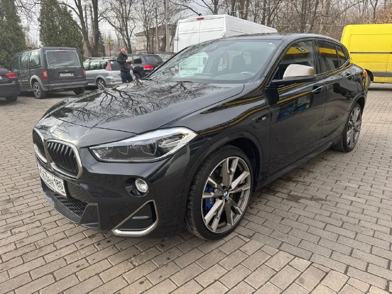 Bmw x2m35i. 306 л. с. год выпуска: 2020. пробег: 73000 км. стоимость: 3 490 000 руб. автомобиль куплен у официального дилера bmw в германии. машина в идеальном состоянии. автомобиль представляет собой уникальный сплав полноприводного кроссовера, с увеличенным дорожным просветом и спортивного автомобиля, с невероятной динамикой. машина в максимальной комплектации, включая спортивные ковшеобразные сидения, проекцию на лобовое стекло, панорамную крышу, кованные диски r20 и т. д. автомобиль в абсолютно заводском состоянии, безо всякого чип-тюнинга и т. д. имеется вся история обслуживания. все органы и системы исправны и работают также, как на новой машине. невероятно мощный, быстрый и универсальный автомобиль. тел: +7 949 484 29 53 📞 🇷🇺 звоните: +79494842953 - фотография - 1