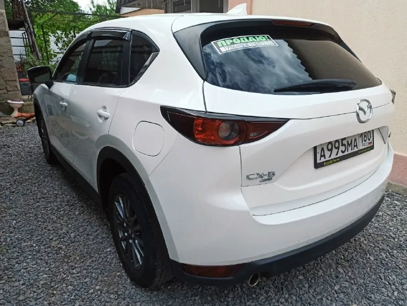 Продам свою машину, mazda cx-5 2020 года, 2.5 бензин, автомат, полный привод! цвет белый перламутр! пробег родной 80000км, не скручен, видно по автотеке. комплектация пред максимальная! кожаный салон, алькантара, без ключевой доступ, кнопка старт стоп, электро зеркала с подогревом. камера заднего вида, датчики предупреждения движения, в круг автомобиля! ️дистроник, датчики мёртвых зон, и движения по полосам!️ датчики давления шин, обогрев лобового и заднего стекла, подогрев сидений. в комплектации есть всё, ️ кроме люка, или панорамы!️ ️️кузов в идеальном состоянии, только два косметических подкрасса, без коррозии, и вмятин! двигатель🔥 работает как часы, коробка работает идеально! ️салон очень ухоженный, как у нового автомобиля! всё в оригинале, работает без посторонних шумов и звуков! один владелец по документам!️️ торг возле машины!️ цена 2760000₽. +79493138514 мтс. +79885815636 📞 звоните: +7(949)3138514 - фотография - 4