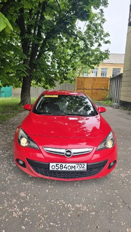 Продается opel astra gts! 🔹 год выпуска: 2012 🔹 пробег: 160,000 км 🔹 двигатель: 1.4 л, бензин 🔹 коробка передач: механическая 🔹 цвет: красный 🔴 особенности: • спортивный дизайн и стильный внешний вид • просторный и комфортный салон • экономичный расход топлива • хорошая динамика и управляемость дополнительно: • кондиционер • электростеклоподъемники • магнитола с bluetooth • сигнализация • подогрев руля • подогревы сидений • и много интересного автомобиль в отличном состоянии, обслуживался вовремя. все документы в порядке. 💰 цена: 675,000 руб. 📞 звоните для получения дополнительной информации и организации просмотра: +7949 330 33 32 - фотография - 1
