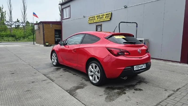 Продается opel astra gts! 🔹 год выпуска: 2012 🔹 пробег: 160,000 км 🔹 двигатель: 1.4 л, бензин 🔹 коробка передач: механическая 🔹 цвет: красный 🔴 особенности: • спортивный дизайн и стильный внешний вид • просторный и комфортный салон • экономичный расход топлива • хорошая динамика и управляемость дополнительно: • кондиционер • электростеклоподъемники • магнитола с bluetooth • сигнализация • подогрев руля • подогревы сидений • и много интересного автомобиль в отличном состоянии, обслуживался вовремя. все документы в порядке. 💰 цена: 675,000 руб. 📞 звоните для получения дополнительной информации и организации просмотра: +7949 330 33 32 - фотография - 6