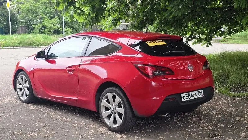 Продается opel astra gts! 🔹 год выпуска: 2012 🔹 пробег: 160,000 км 🔹 двигатель: 1.4 л, бензин 🔹 коробка передач: механическая 🔹 цвет: красный 🔴 особенности: • спортивный дизайн и стильный внешний вид • просторный и комфортный салон • экономичный расход топлива • хорошая динамика и управляемость дополнительно: • кондиционер • электростеклоподъемники • магнитола с bluetooth • сигнализация • подогрев руля • подогревы сидений • и много интересного автомобиль в отличном состоянии, обслуживался вовремя. все документы в порядке. 💰 цена: 675,000 руб. 📞 звоните для получения дополнительной информации и организации просмотра: +7949 330 33 32 - фотография - 7