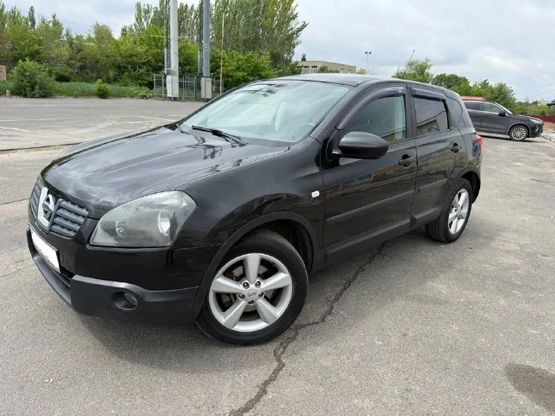 Nissan qashqai, 2008 г. атмосферный бензиновый двигатель 2.0 л. пробег —196 000 км. полный привод. автомобиль в хорошем состоянии: — кузов оцинкован, стекла оригинальные, все системы безопасности исправны. — максимальная комплектация: панорамная крыша, датчики света и дождя, двухзонный климат-контроль, мультируль, все 4 электростеклоподъемника, и др. — двигатель работает ровно, без посторонних шумов и ошибок. — коробка передач переключается четко. — полностью обслужен, не требует дополнительных вложений. документы в полном порядке, техосмотр пройден, готов к постановке на учет. цена: 750 000 руб. город: донецк. телефон: +7 949 371-08-26 (есть мах, telegram). по запросу вышлем видеообзор автомобиля. 📞 звоните: +7(949)3710826 - фотография - 1