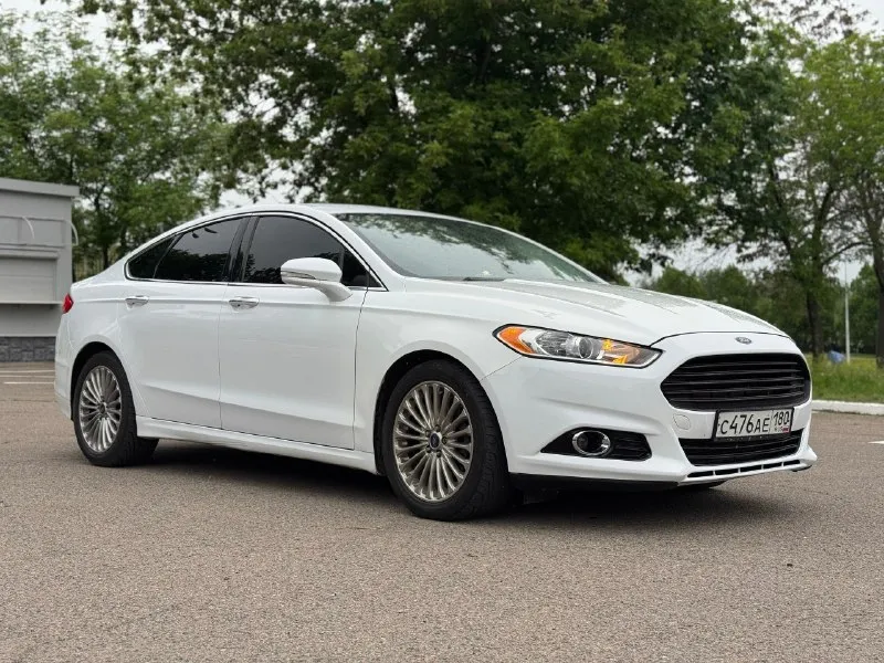 Продам ford fusion объем: 2 литра бензин. коробка: 6-ти ступенчатый классический автомат. год: 2015 ✅ кузов в очень хорошем состоянии. ✅ стекла все родные. ✅ машина местная. автомобиль в техническом плане в отличном состоянии. следили и ухаживали, денег не жалели. замена масла строго раз в 6,5-7 тыс км. , коробка без нареканий. подвеска - мячик, без посторонних звуков и стуков. салон в хорошем состоянии. не прокурен, не затерт. очень хорошая комплектация titanium. есть все. старт-стоп. безключевой доступ. подогревы сидений. камера заднего вида, парктроники. эл. рег. сидений с памятью. датчик света, дождя. круиз. хорошая музыка. и многое другое. машиной будете довольны. цена: 1,250 ₽ торг будет! +7949-606-44-51 нахожусь в донецке. 📞 звоните: +7(949)6064451 - фотография - 3